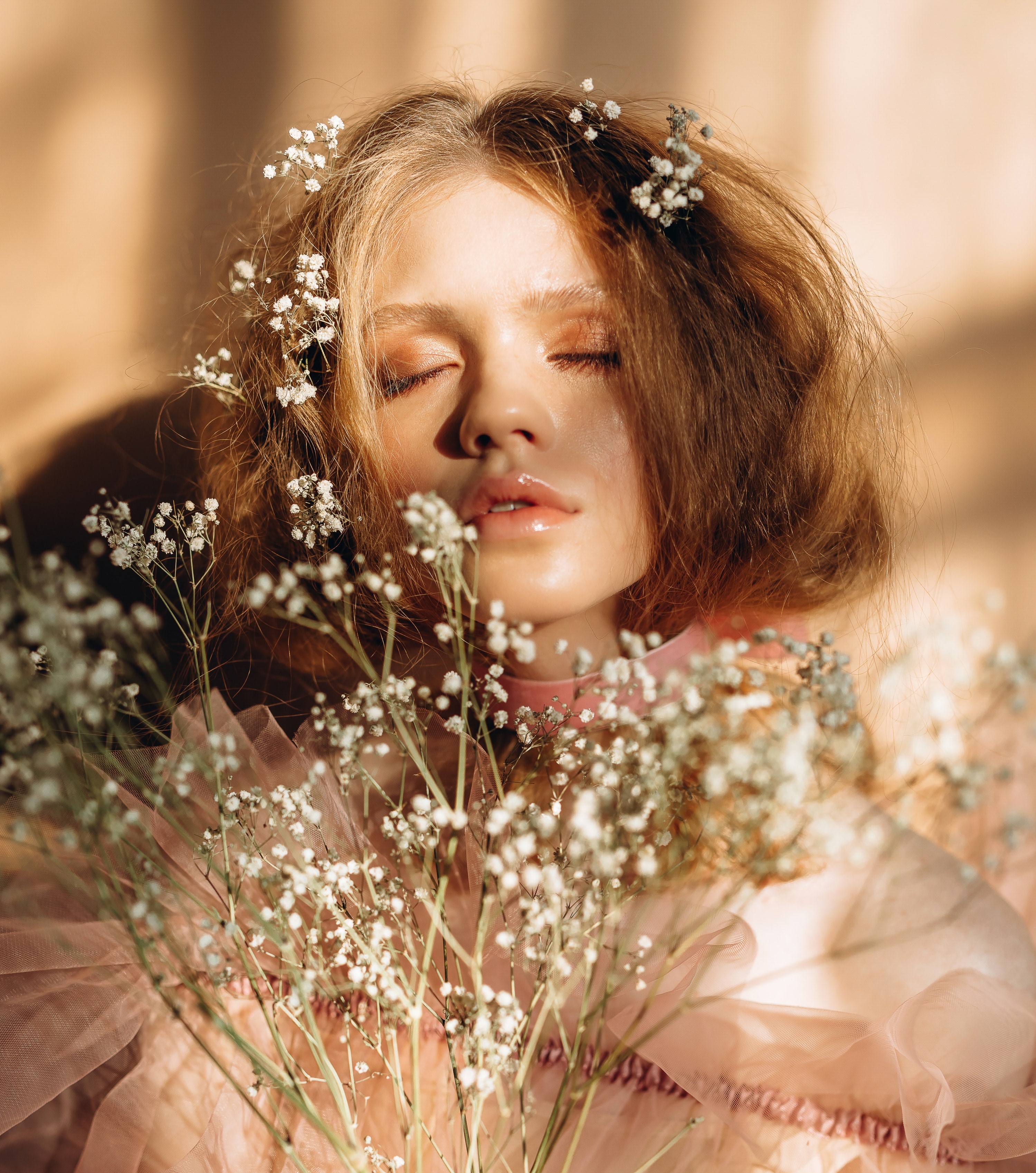 Women holding folwers